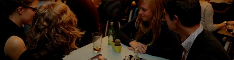 A couple of people looking at a tablet